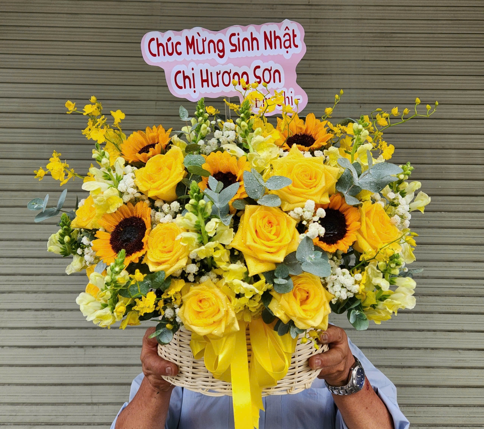bó hoa hướng dương gói giấy xanh dương